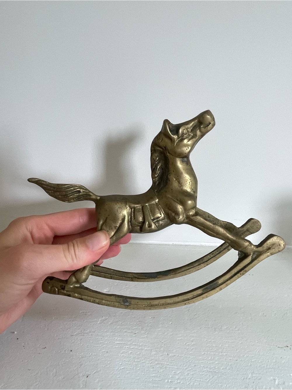Antique brass rocking horse